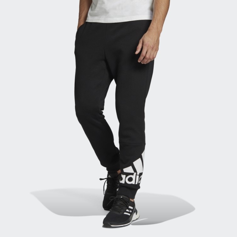 Pantalon Fuselé Logo Essentials En Polaire Adidas Noir