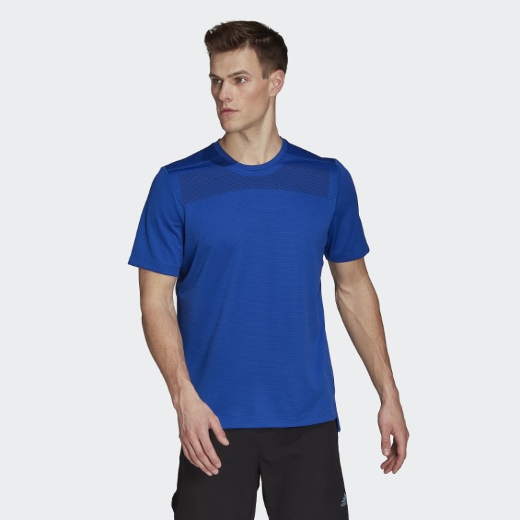 Adidas T-shirt Bleu Roi Imprimé à Impact Sur Le Devant Du Rack D'entraînement