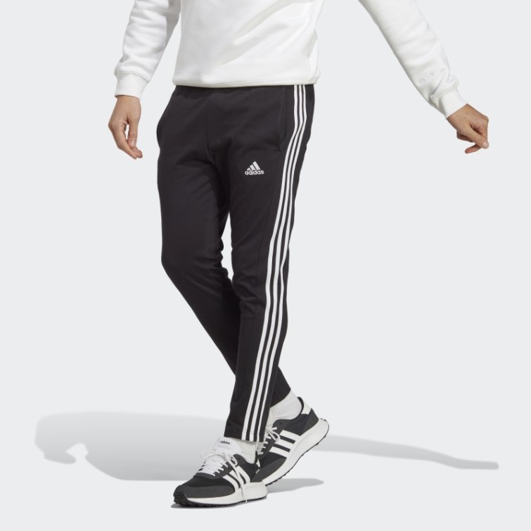 Essentials Pantalon Simple Jersey Fuselé Ourlet Ouvert 3 Bandes Adidas Noir